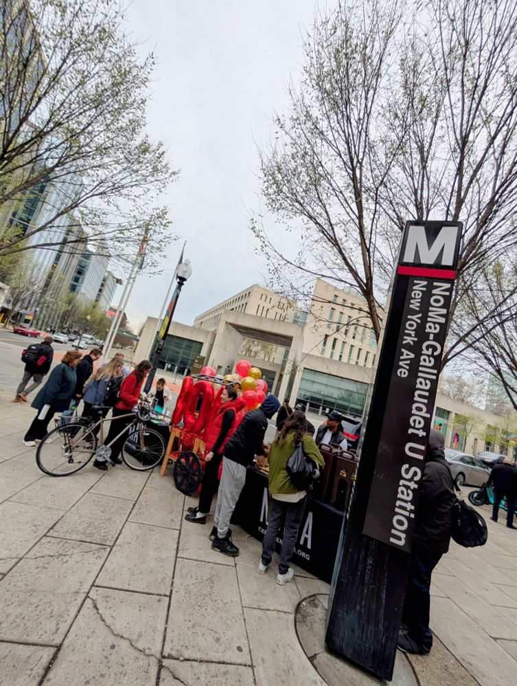 NoMa metro riders gather at the N St exit of the NoMa - Gallaudet U metro stop to celebrate record breaking ridership with free coffee, cookies, and swag.