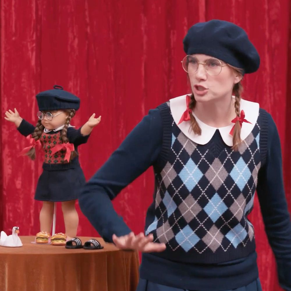 Vic Michaelis wearing the exact same outfit as an American Girl doll.