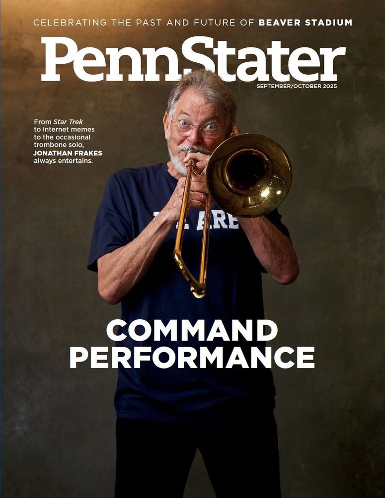 Jonathan Frakes playing a trombone