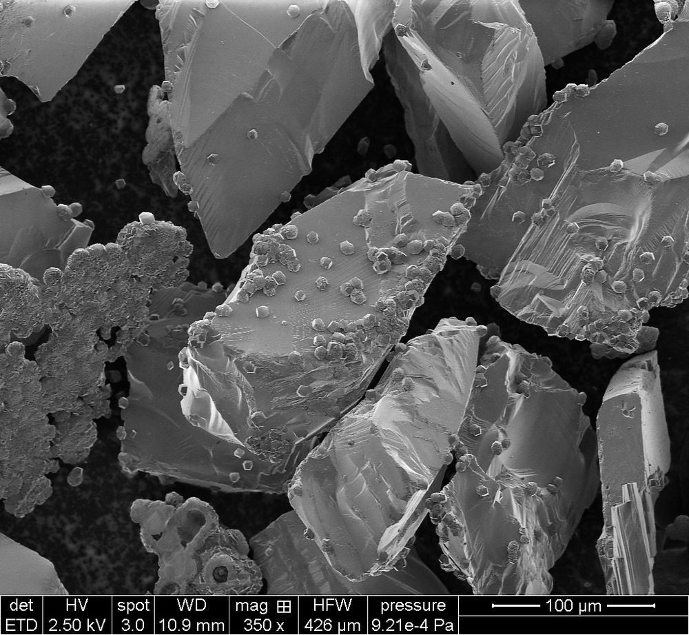 Microscopic view of basalt at 350x magnification, showing detailed surface texture. Credit: University of Calgary