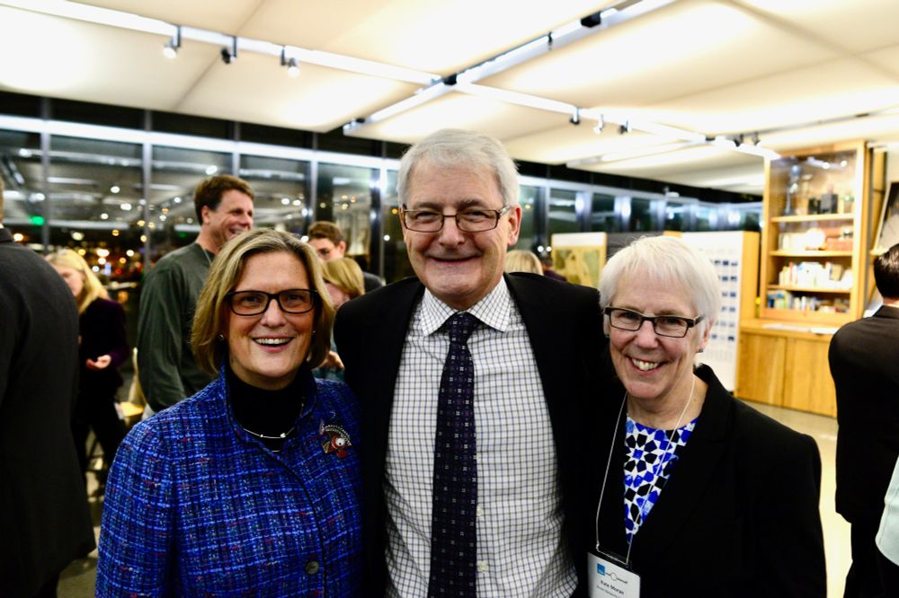 A photograph of three people, smiling happily at the camera. On the left is a blonde woman with glasses and a blue blazer, in the middle is a man with gray hair and glasses in a suit, and on the right is a woman with short gray hair with glasses in a black blazer.

(L to R) Kathy Sullivan, former NASA astronaut, US Navy officer, and NOAA Administrator; Honourable Marc Garneau, former Minister of Transport of Canada and Canadian astronaut, and Kate Moran, ONC CEO and President. 