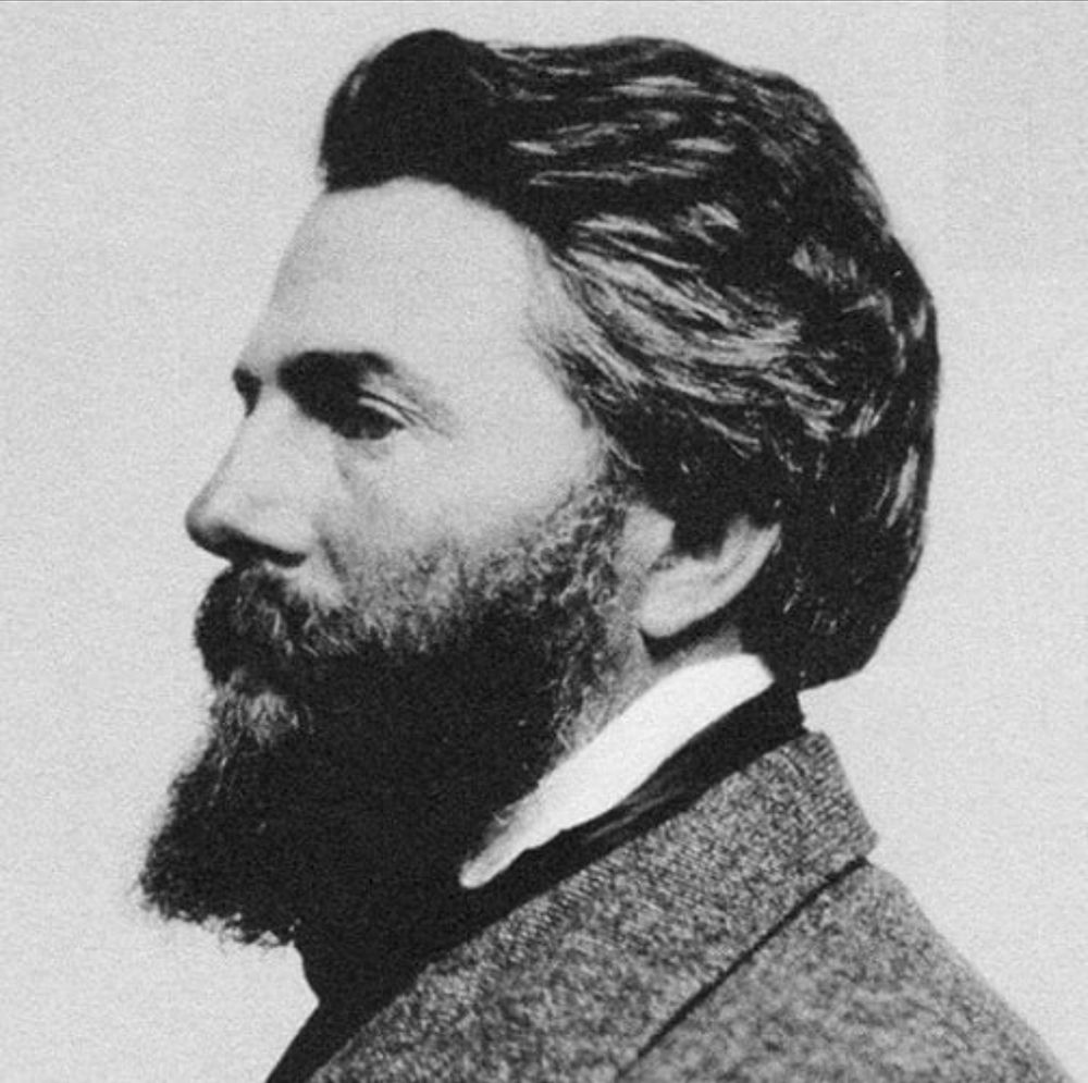 Black and white photo of gay American author, Herman Melville, in profile. 