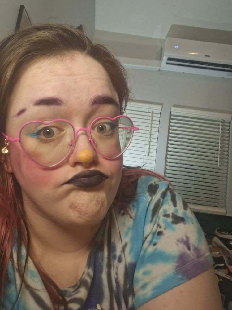 clownin

pink cheeks, black lipstick, blue eyeliner, yellow swirly on my nose + i did put purple in my eyebrows but it's not picking up well here lol