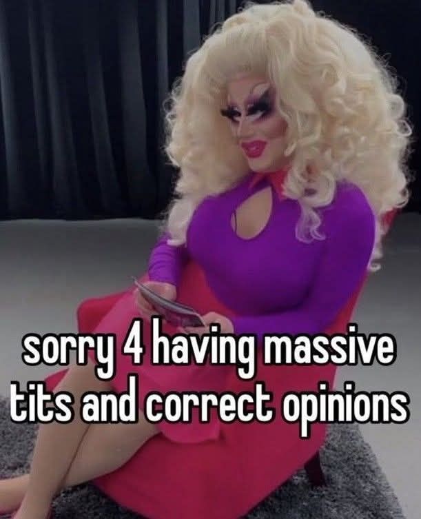 picture of trixie mattel sitting with her legs crossed while holding interview cards + smiling, captioned "sorry 4 having massive tits and correct opinions"