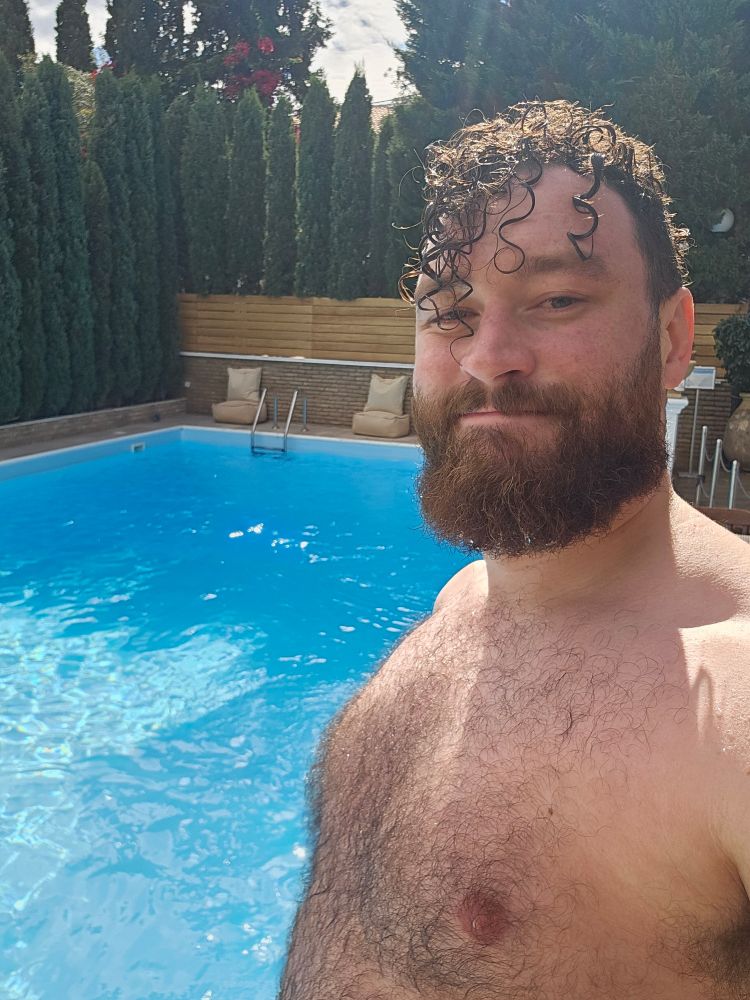 A wet Luke by a (very cold!!!) pool after swimming 