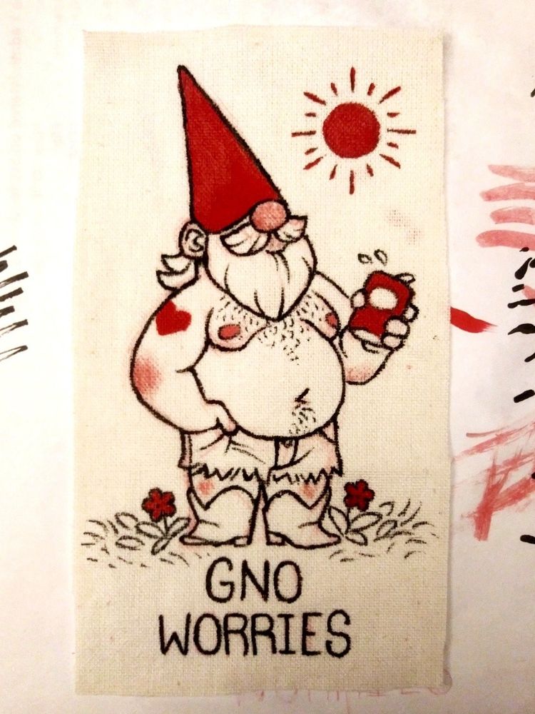 A heavily bearded gnome, bare-chested with his belly out 

"GNO WORRIES"