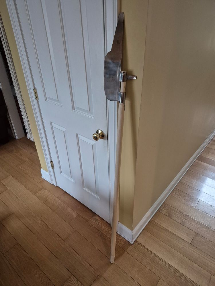 A work in progress glaive (polearm), with the wooden pole still needing to be stained and sealed. 