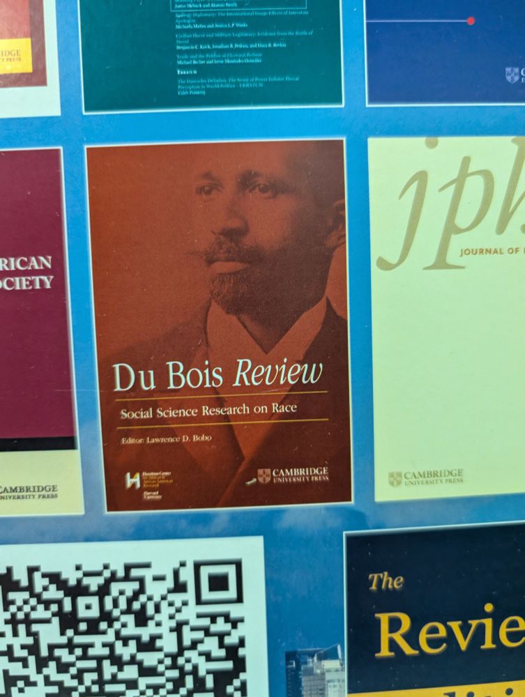 Journal cover for Du Bois Review: Social Science Research on Race, with portrait photo underlay of WEB.