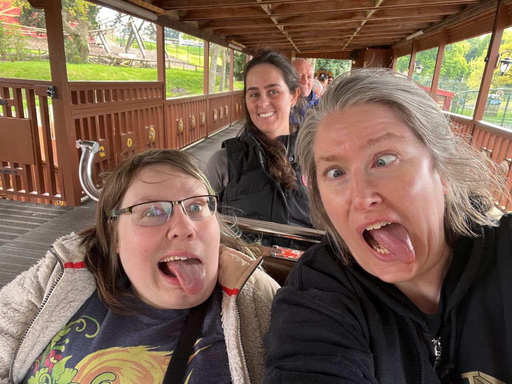 D and E onna same dinky coaster being PHOTOBOMBED by the lady behind us who did NOT UNDERSTAND THE ASSIGNMENT