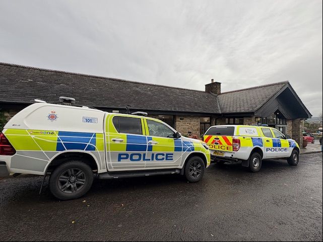 Two Lancashire Constabulary Rural Crime Unit vehicles outside conference venue in Langho, Lancashire