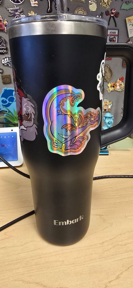 Cup with a holographic Figment sticker. 