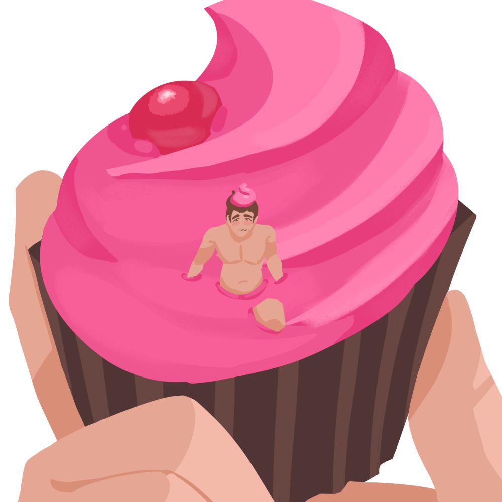 A pink cupcake held up by two fingers. A tiny man stuck in the frosting 