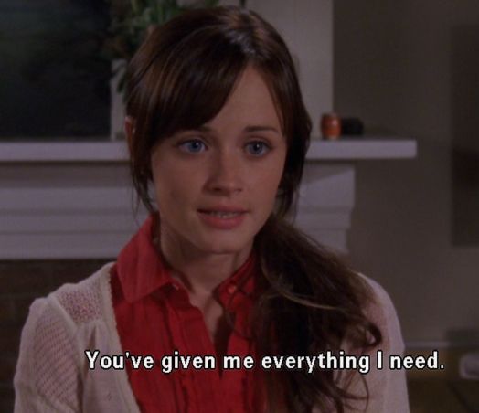 Rory in the final episode of Gilmore Girls. Wearing a red top and white cardigan. She is saying one of her final lines to Lorelai. ‘you’ve given me everything I need’
