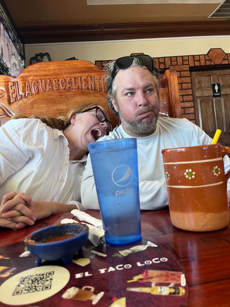 Stacy and I trying to make a baby laugh 
