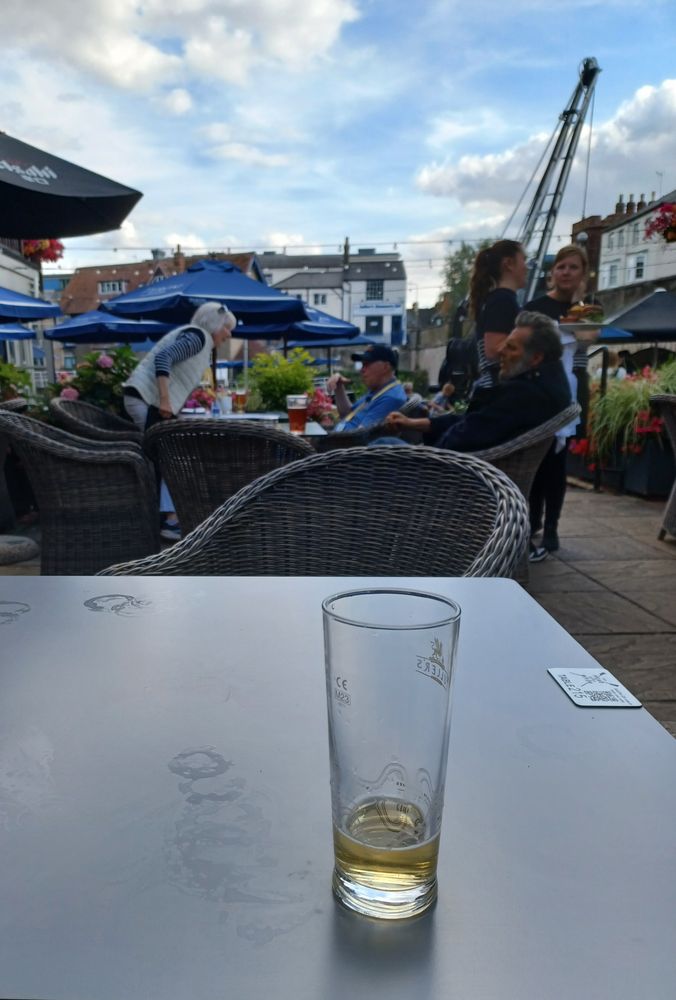 A cold drink at a riverside pub. 