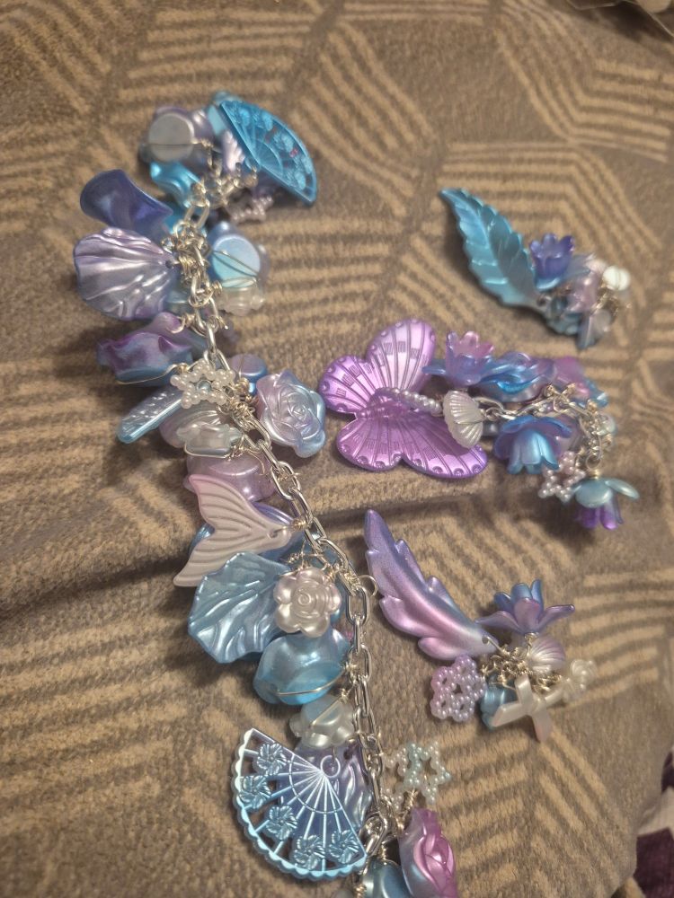 Blue, white and purple beaded jewelry set. 