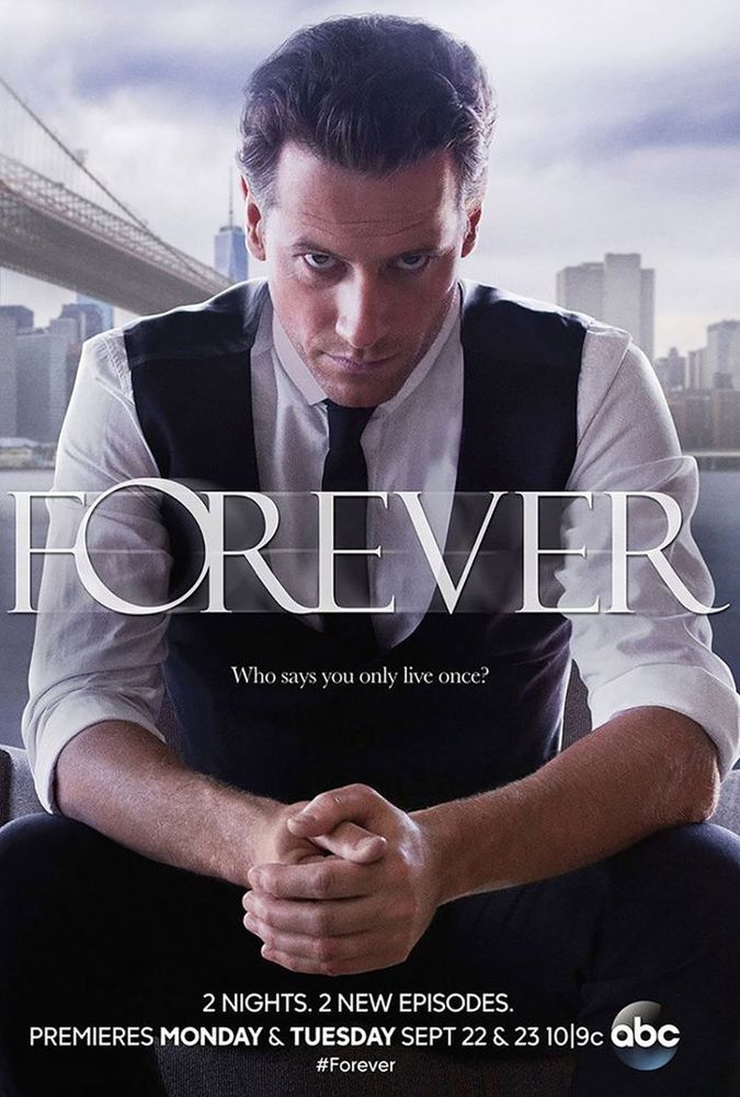 Poster for the 2014 tv show forever a city background, actor Ioan Gruffudd in a white dress shirt, black vest and tie. There is a subtitle "who says you only live once"