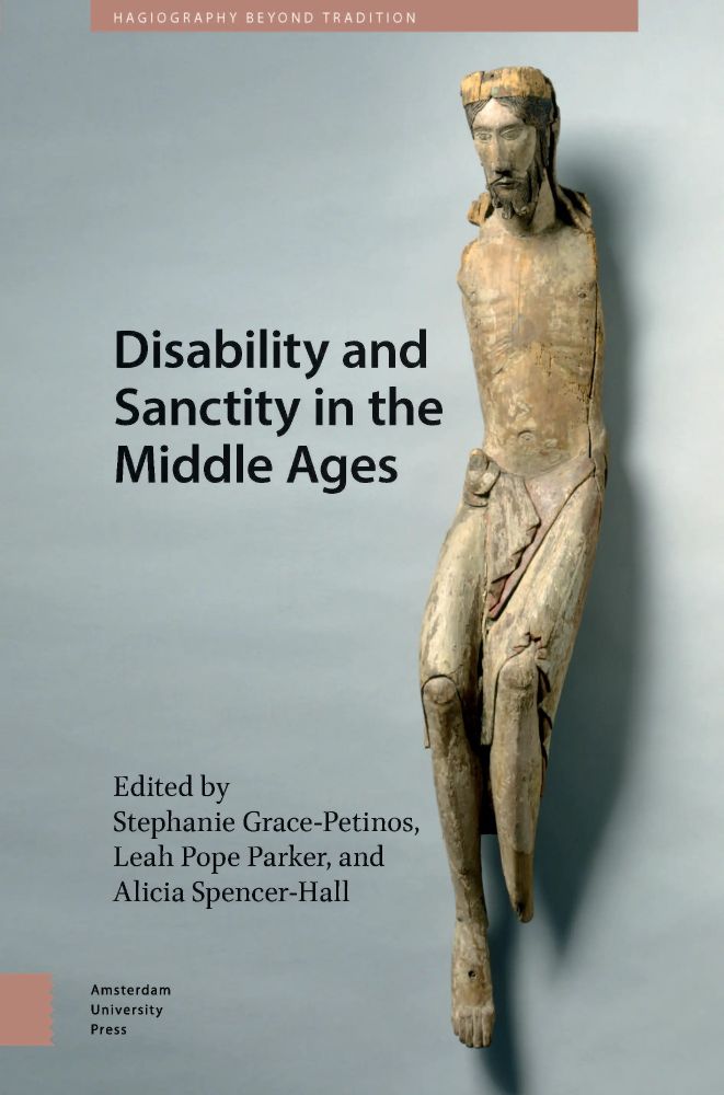 Front cover of Disability and Sanctity in the Middle Ages. On a pale grey background, a medieval wooden crucifix casts a shadow to its right. Christ is missing his arms and part of his left lower leg. The Crucific is worn, in the process of disintegration.