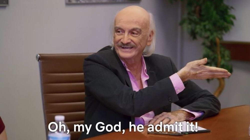 A smiling old man, gesticulating, saying "Oh, my God, he admit it!"