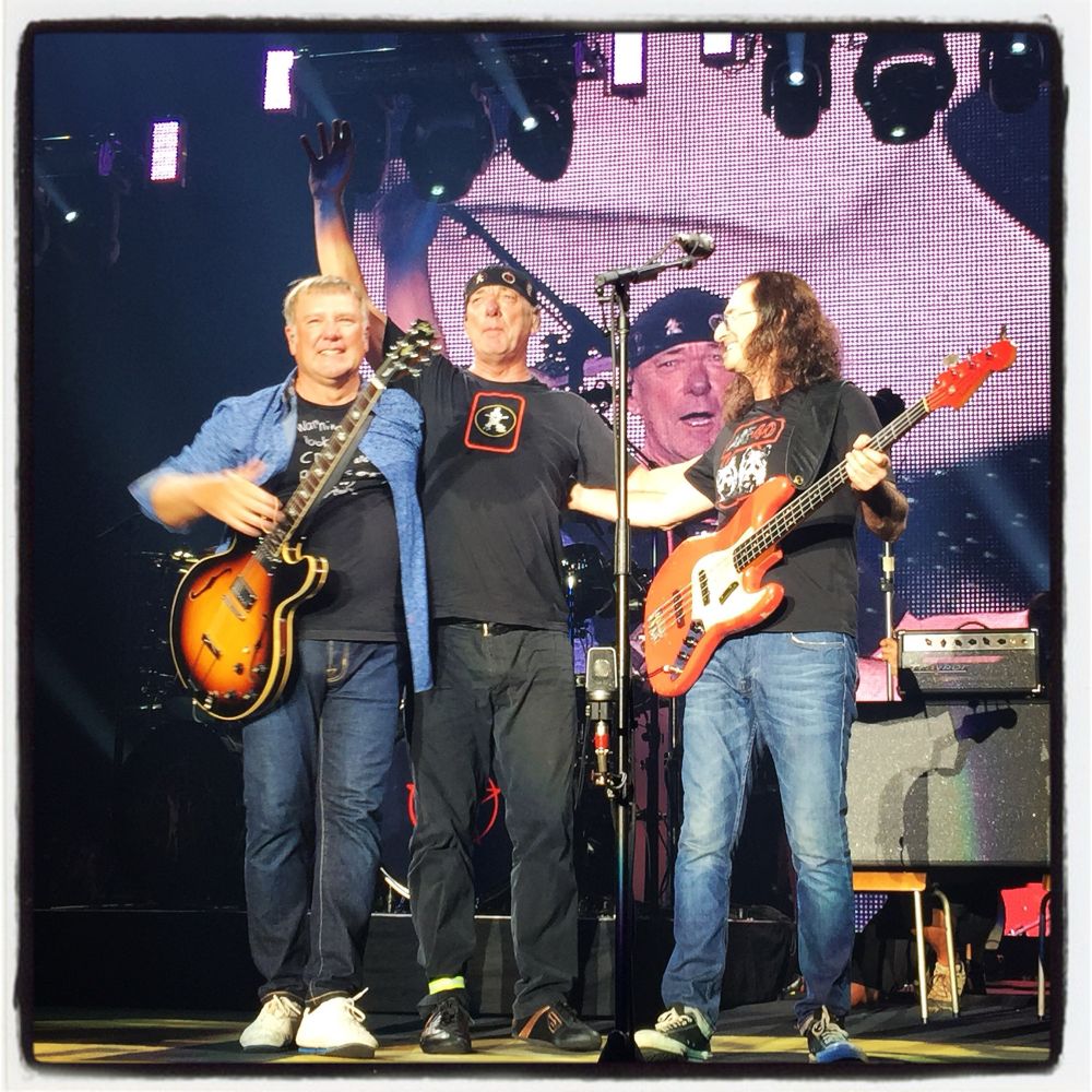Alex Lifeson, Neil Peart, and Geddy Lee of Rush take their final bow on 8/1/15 at the Forum in Los Angeles. 