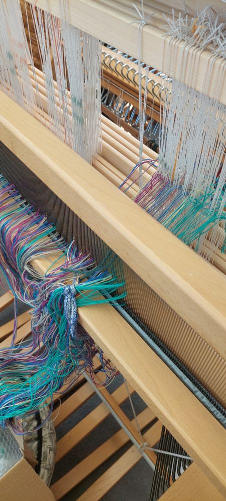 Part way through threading heddles