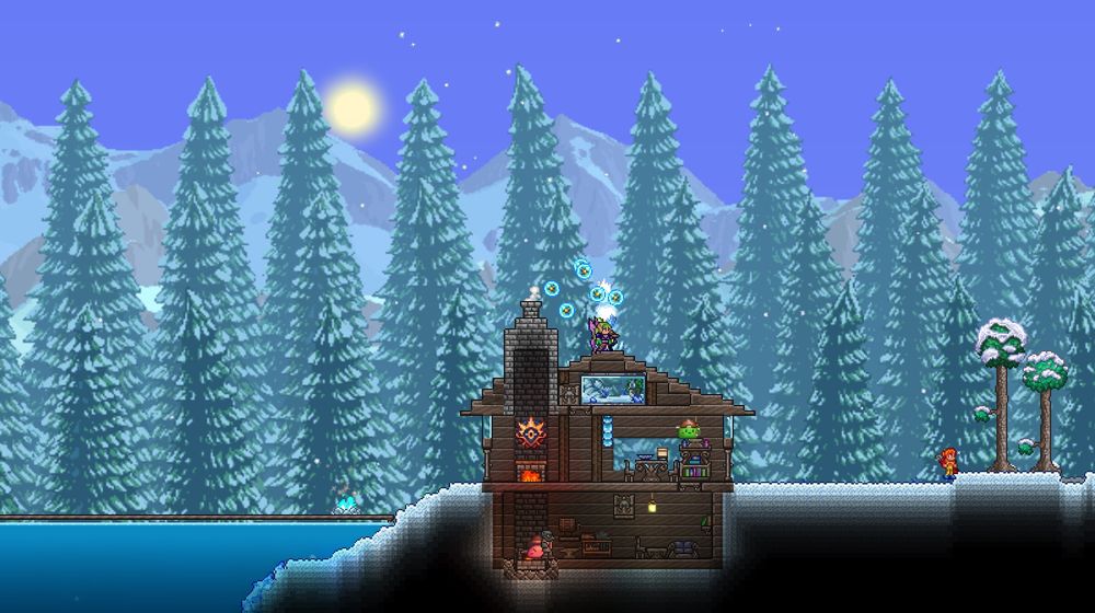 screenshot of my tundra terraria house made out of boreal wood with a cute basement