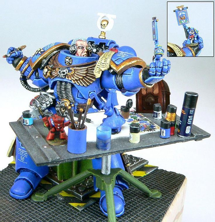 2000s era golden daemon diorama of an ultramarine at his painting desk