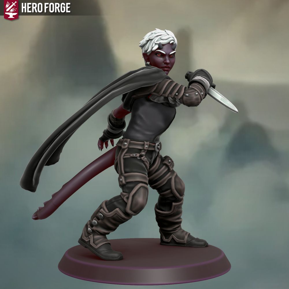 A figurine created in Hero Forge of a woman with short white hair and eyebrows, red eyes with black sclera, dark purple almost black skin, short black horn nubs over her eyes, a demon tail, and black pointed nails.  She is wearing a black sleeveless shirt, black pants with brown leather belt straps and pouches over her hips and thighs, brown leather armor that covers her right arm/shoulder and knee caps, brown leather boots with black soles, black fingerless gloves with white bandages around the wrists, and a black cape over her right shoulder.  She is posed as if she's ready to strike with a dagger.