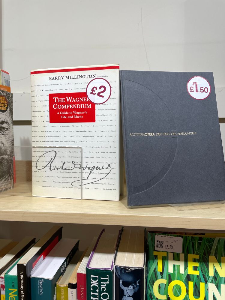 Two books. One a compendium of Wagner, the other a program for a Scottish opera production of the ring trilogy. 