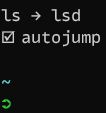Screenshot of my initial terminal launch showing how I point out `ls` is really `lsd` and that autojump is installed.