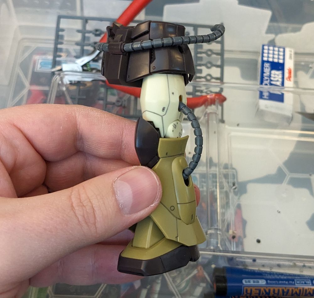 HG Zaku Mobility Demonstrator model kit waist unit. Leg attached.
