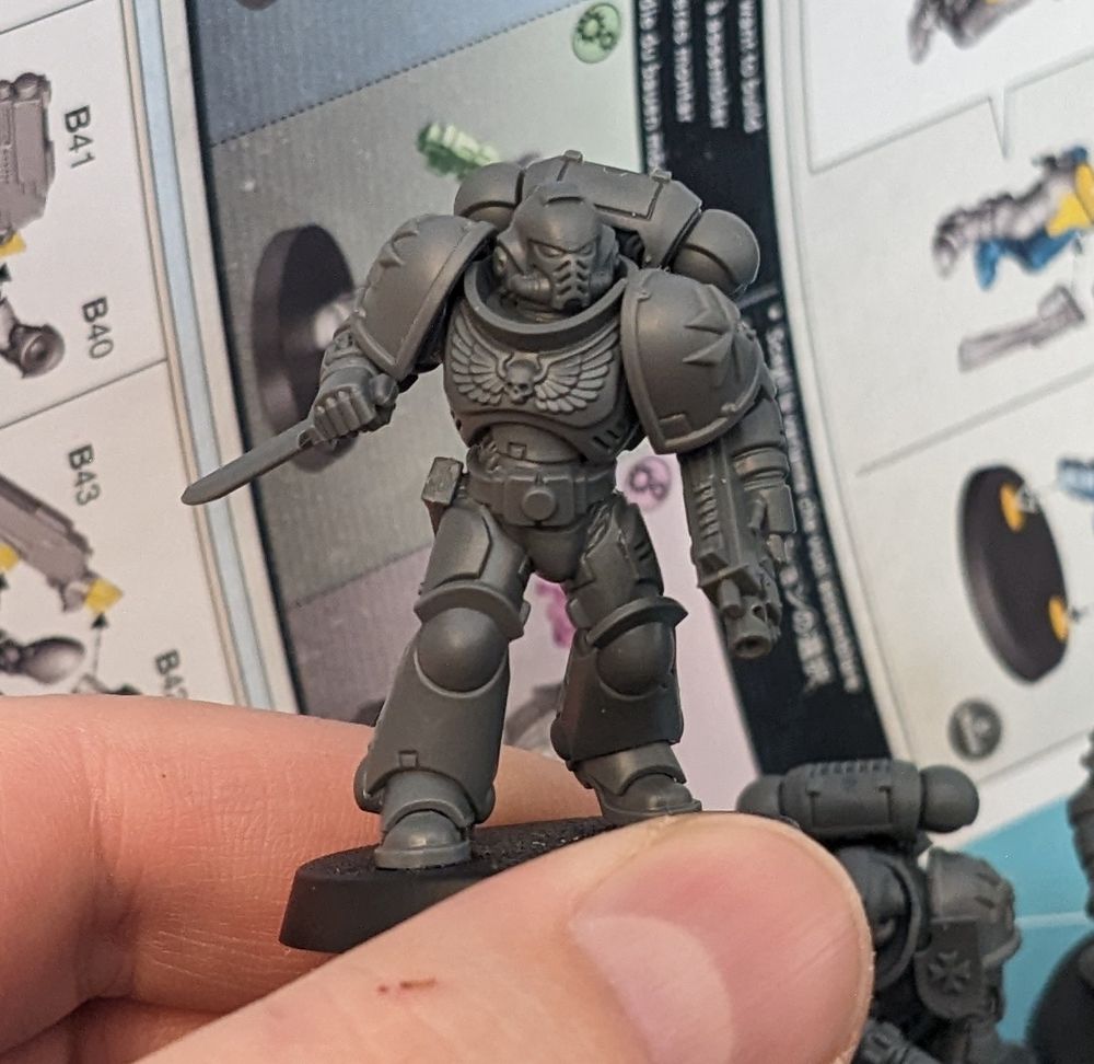 Warhammer 40k model of a Black Templar Intercessor.
