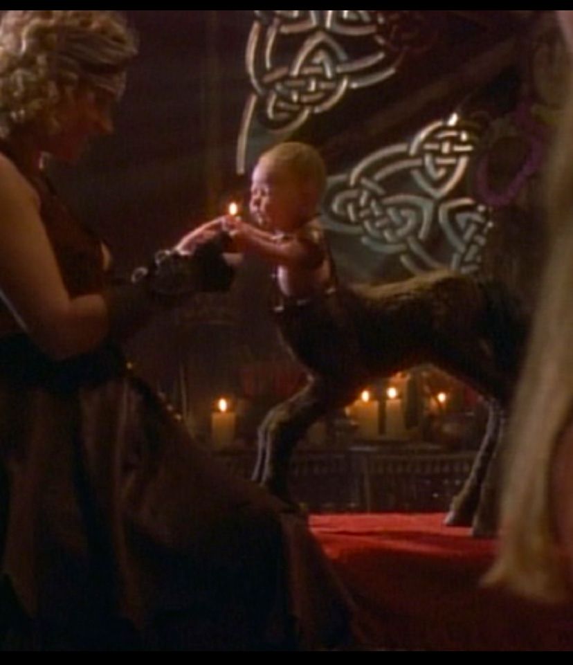 Woman dancing with a centaur baby