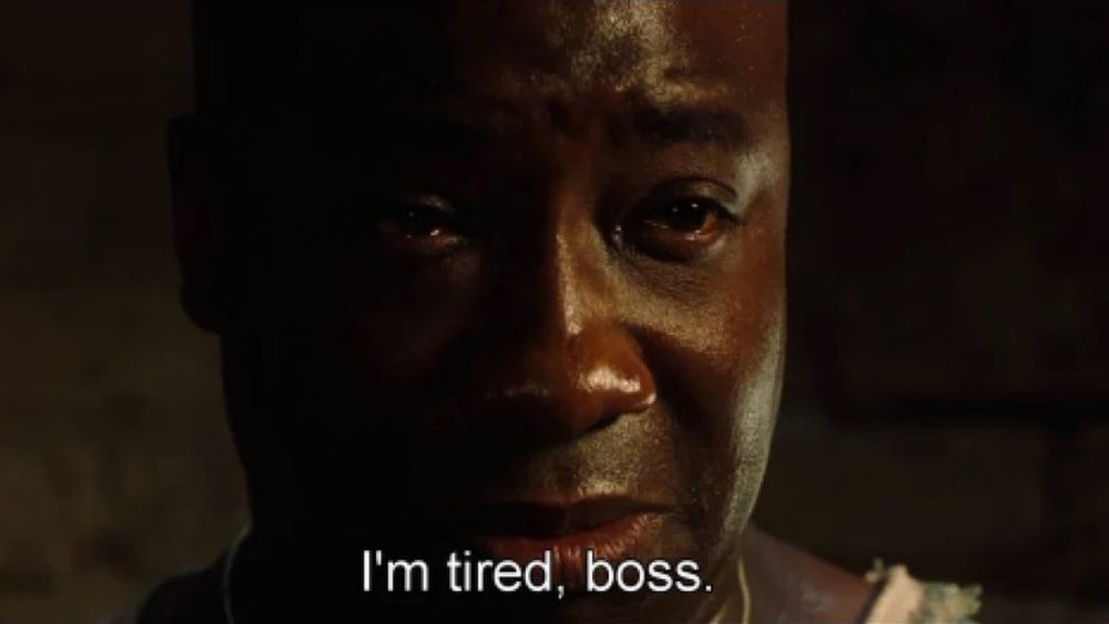 Image from the movie "The Green Mile" where the character John Coffey says "I'm tired, boss" in reference to living life.