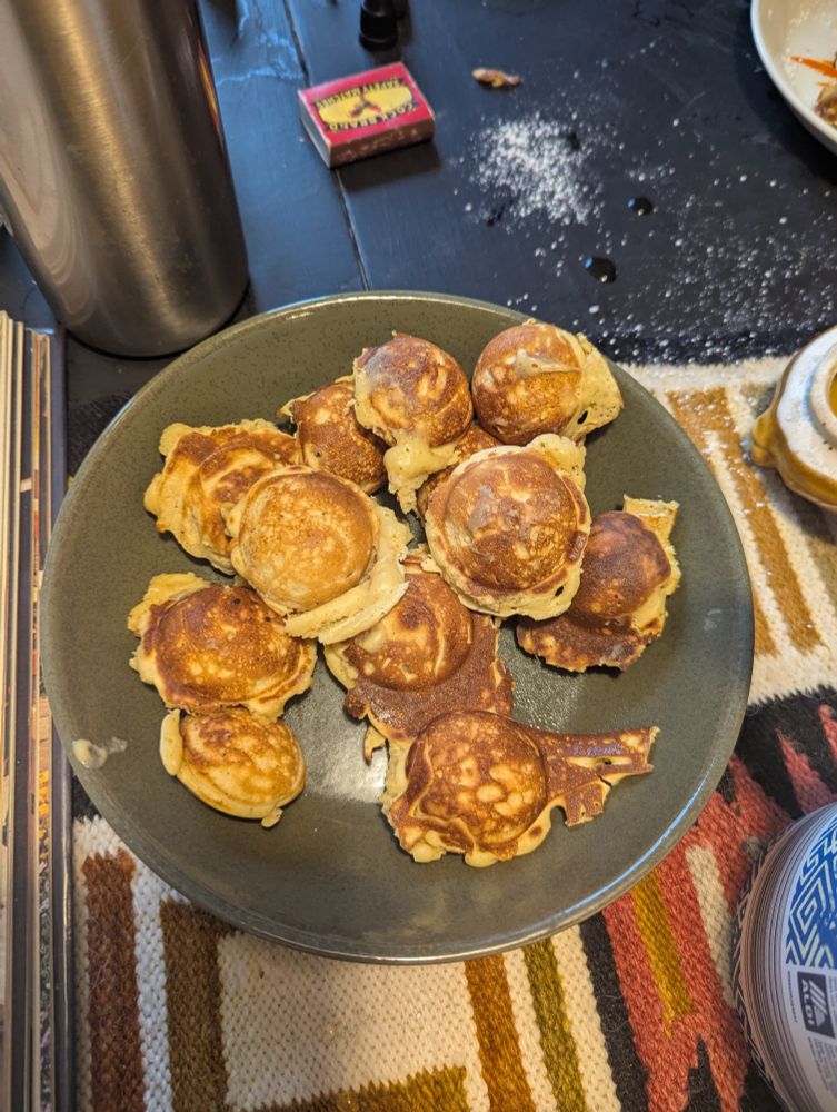 Very small pancakes on a plate