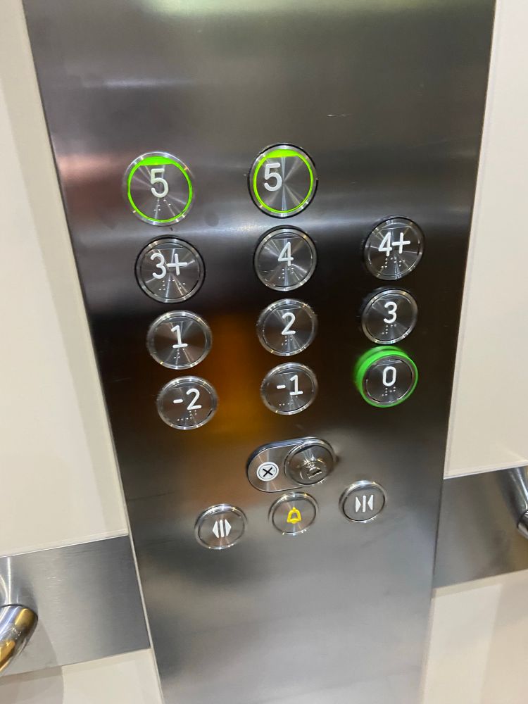 A lift control panel showing all the floor buttons. They range from -2 to 5. There are some extra floors in the list, 3+, 4+, and two floor 5 buttons.