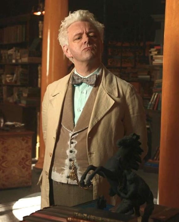 Aziraphale thinking back to earlier times with Crowley. He has his head tilted upwards as he pouts and frowns in thought