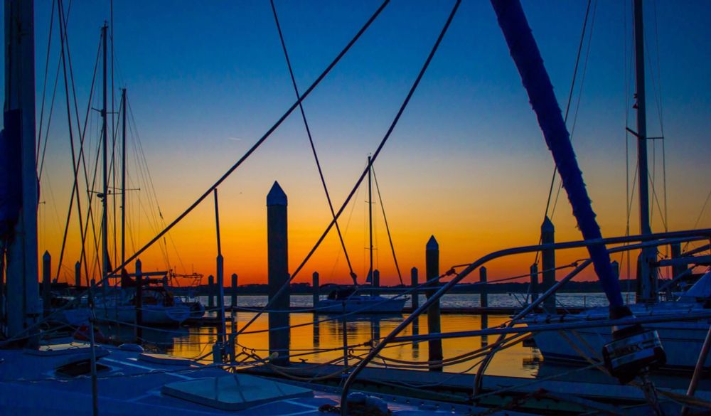 Sunset at a marina with multiple boats on Dataw Island in South Carolina 
