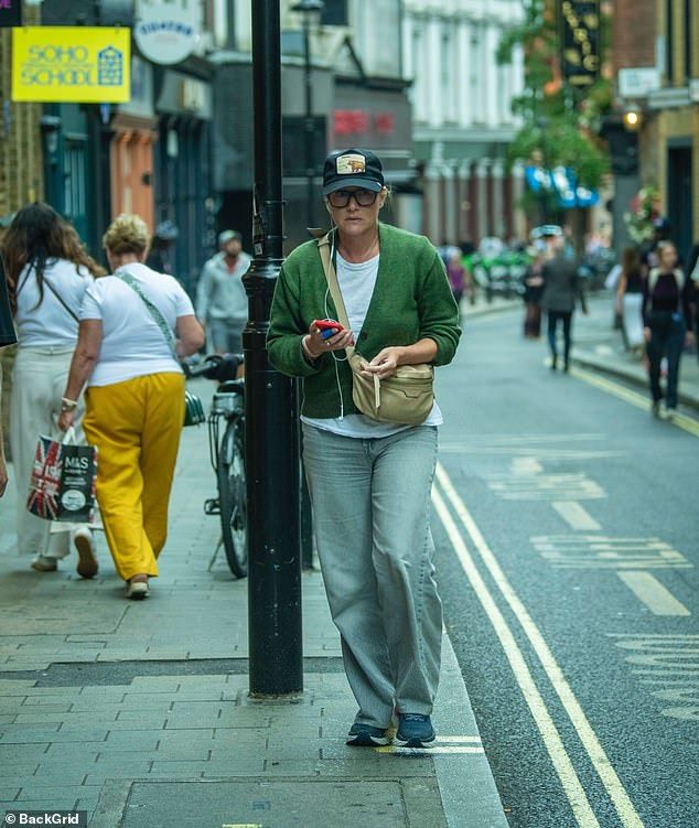 Kate Winslet reveals minor injury as she steps out for low-key outing in London while taking a break from her directorial debut
But on Wednesday, she took a well-deserved break as she headed out in the English capital. 
For the occasion, the actress opted for a casual figure in a green knitted cardigan layered over a plain white top and baggy jeans.
She teamed it with blue trainers, a navy Goorin Bros baseball cap, and a beige crossbody bag.
Kate was listening to music on her phone as she was spotted sporting a plaster on her right index finger. 
https://www.dailymail.co.uk/tvshowbiz/article-15042435/Kate-Winslet-reveals-minor-injury-London-directorial-debut.html
#GoodbyeJune #HelenMirren #ToniCollette #JoeAlfieWinsletMendes #JoeAnders #Katewinslet #Netflix #Andreariseborough