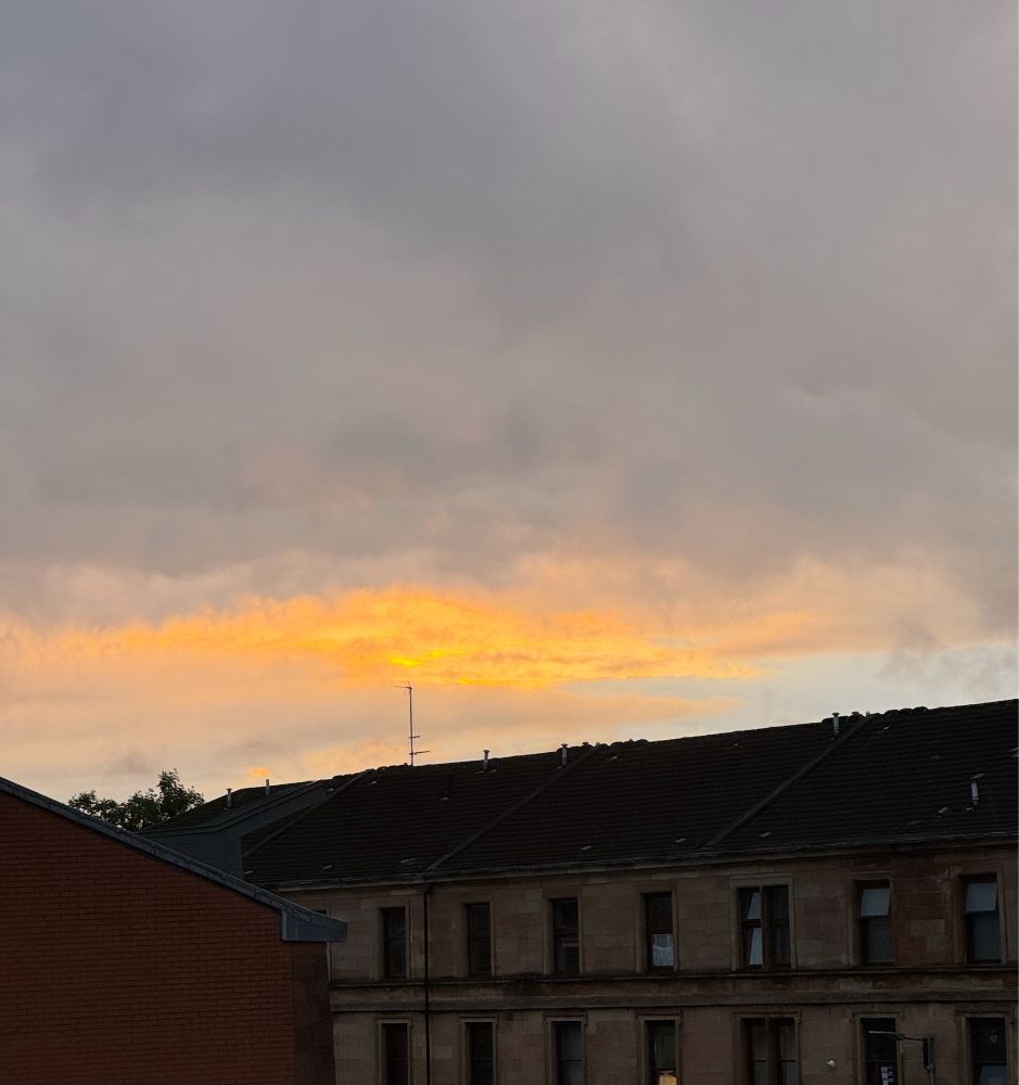 A bit of sunset showing through heavy clouds