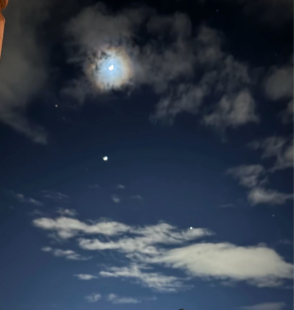 A picture of the night sky under the moonlight