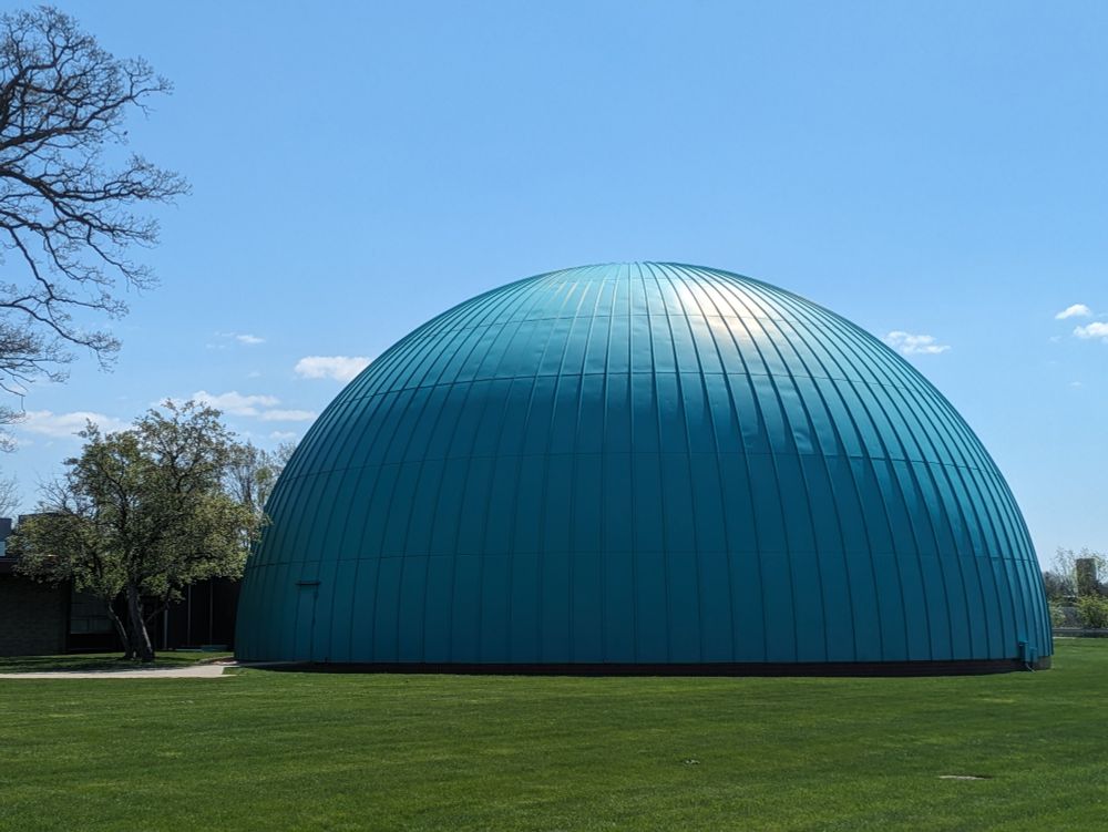 The iconic blue-green dome of Longway Planetarium in Flint