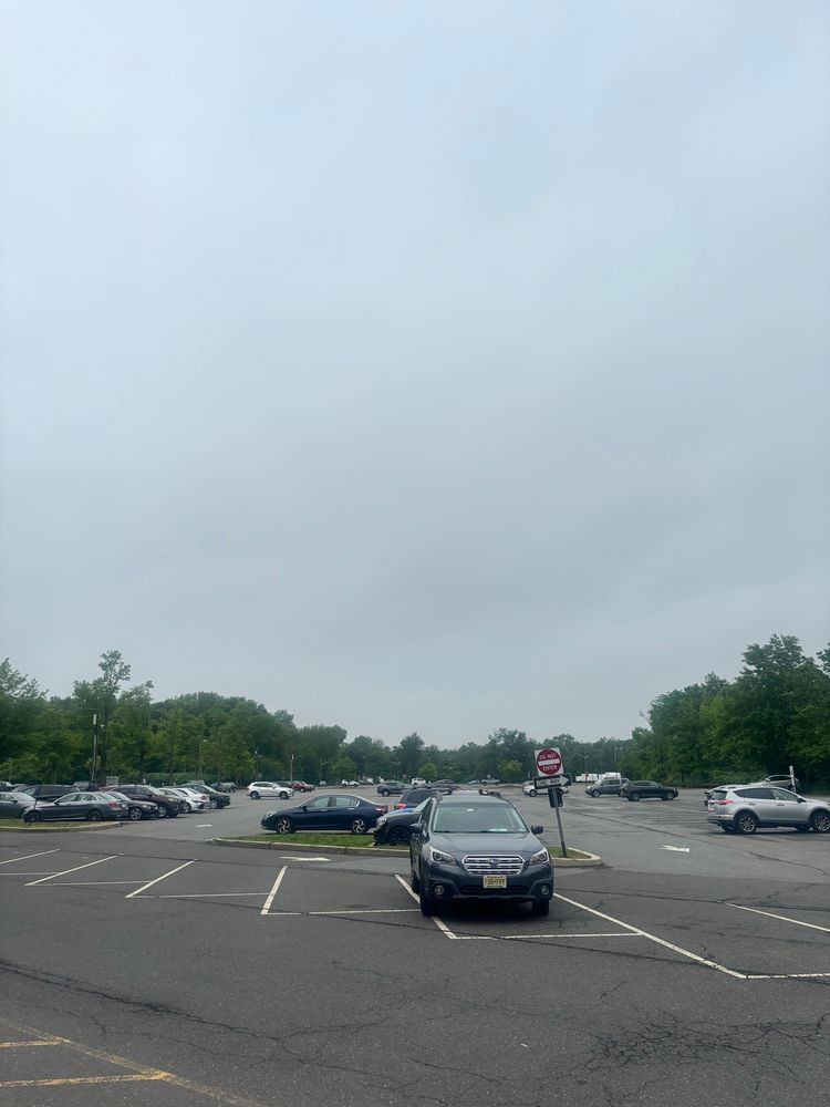 Virtually empty parking lot with lots of open spots