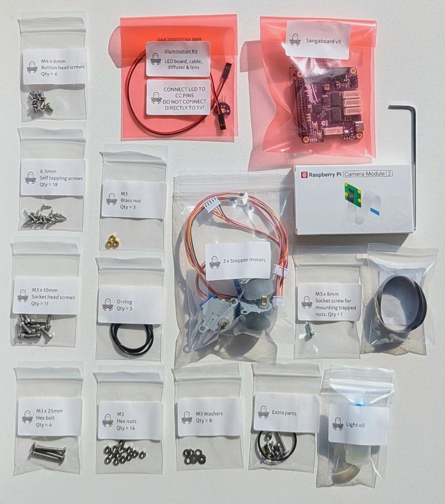 A dozen plastic bags of components, washers etc from UK company Labcrafter to build a 3-D printed microscope designed by OpenFlexure. Image from Labcrafter, at https://labcrafter.co.uk/products/openflexure-microscope