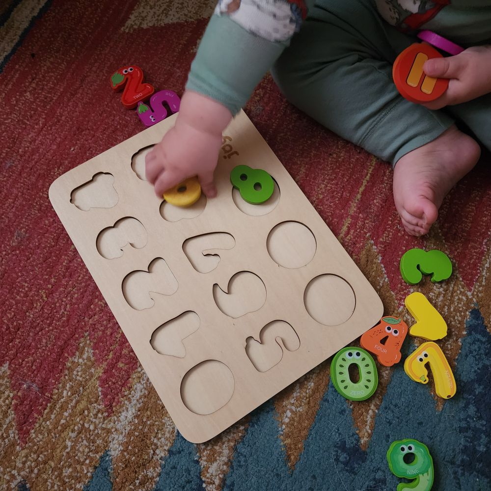 My sweet baby and I checking out his new puzzle.