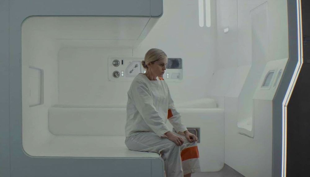 Deirdre from tv show Andor, sitting in a prison cell from which there is no escape. 