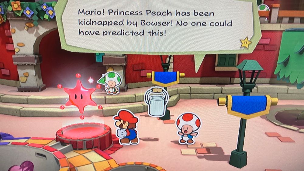 Scene from Paper Mario: Color Splash where a panicked Toad says: “Mario! Princess Peach has been kidnapped by Bowser! No one could have predicted this!”