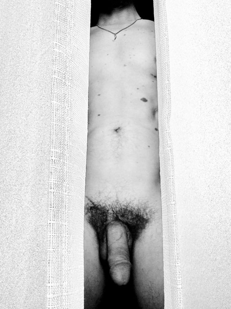 Monochromatic nude of me between the curtains 
