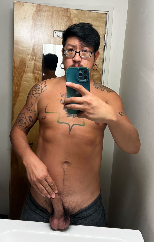 Naked guy with balls on the sink