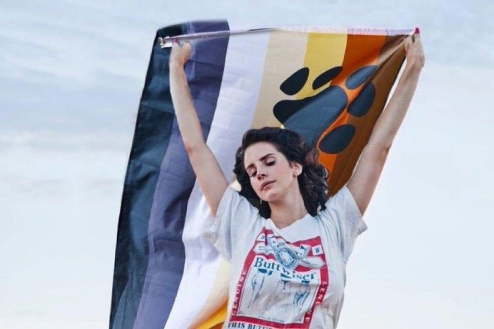 Lana del Rey holding a Bear Pride flag